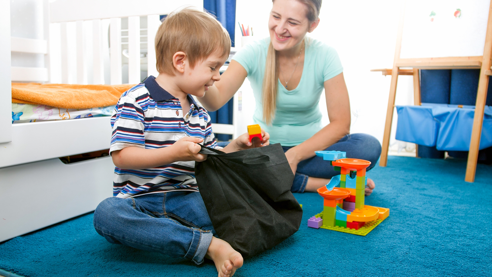 Cute,Smiling,Toddler,Boy,Tidying,Up,His,Room,And,Picking